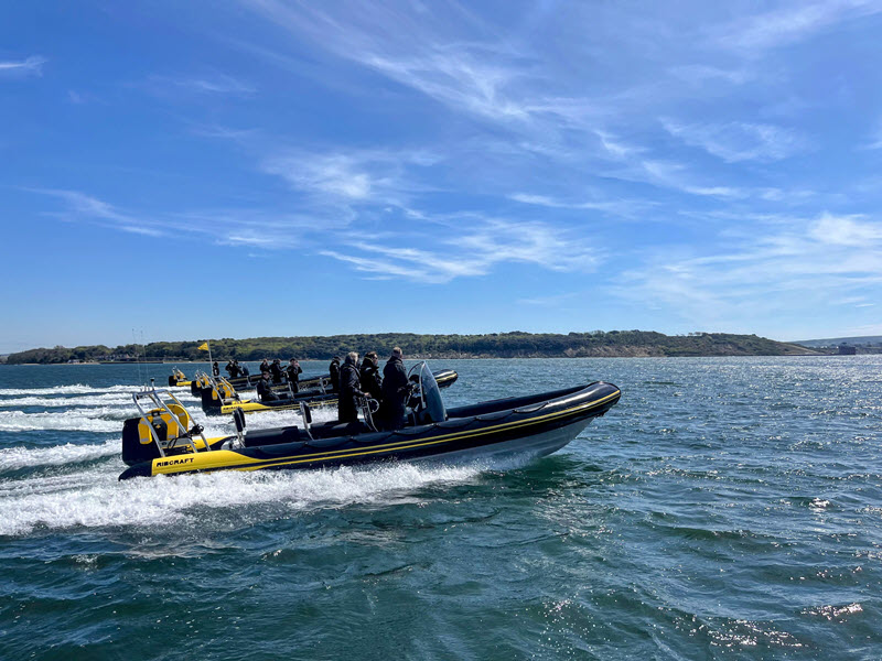 Ribcraft RIB boats at speed on the Solent with passengers enjoying an exhilarating charter experience